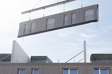 A LENO®-ADD external wall comes flying in